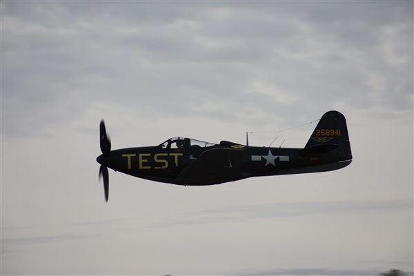 Airplane in overcast sky