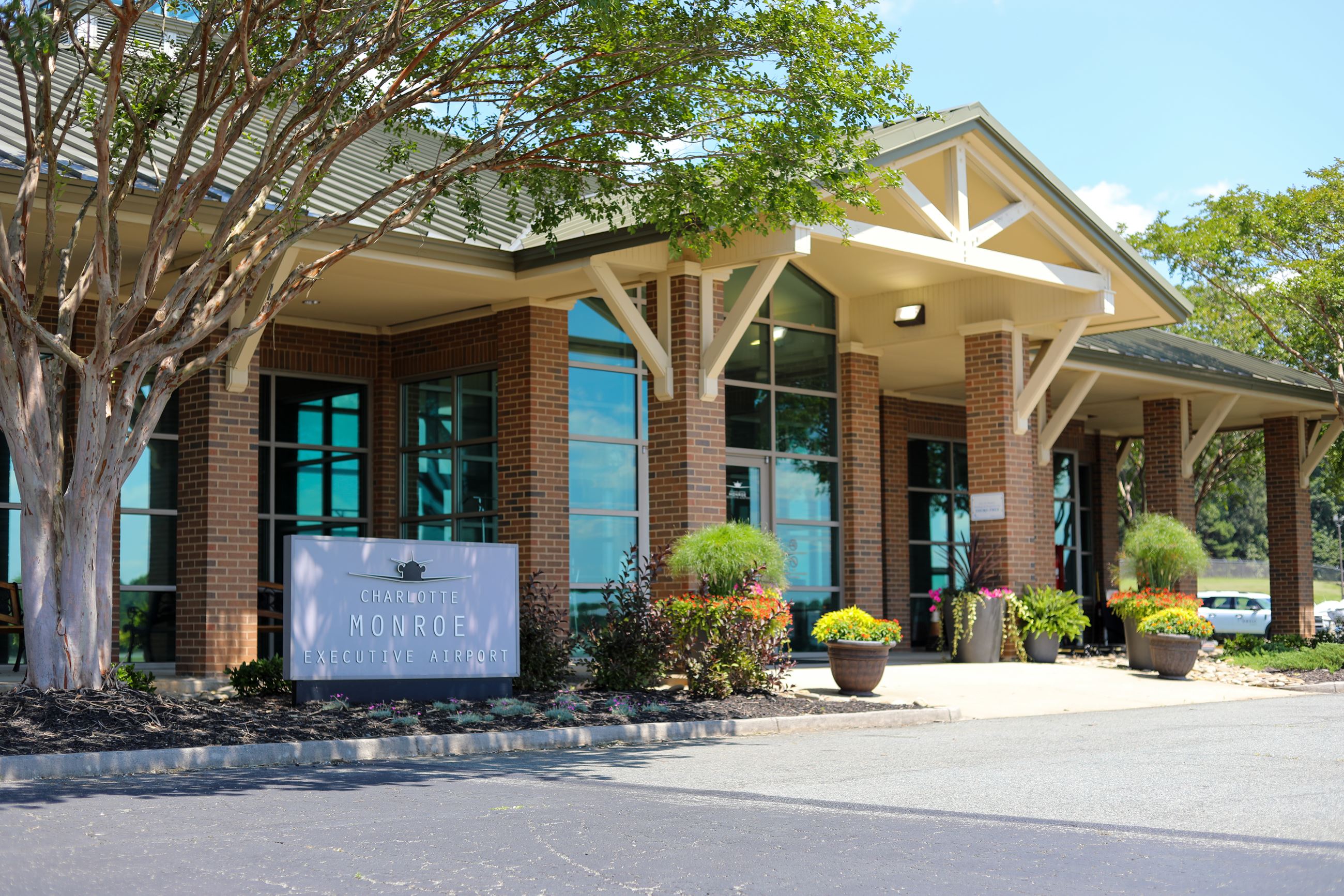 A wide exterior picture of the airport terminal building